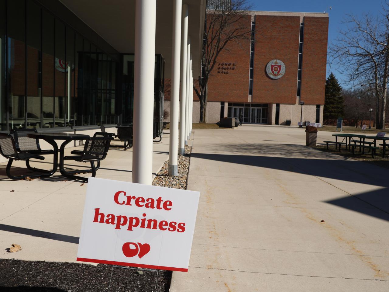 Create kindness sign in front of the Webb