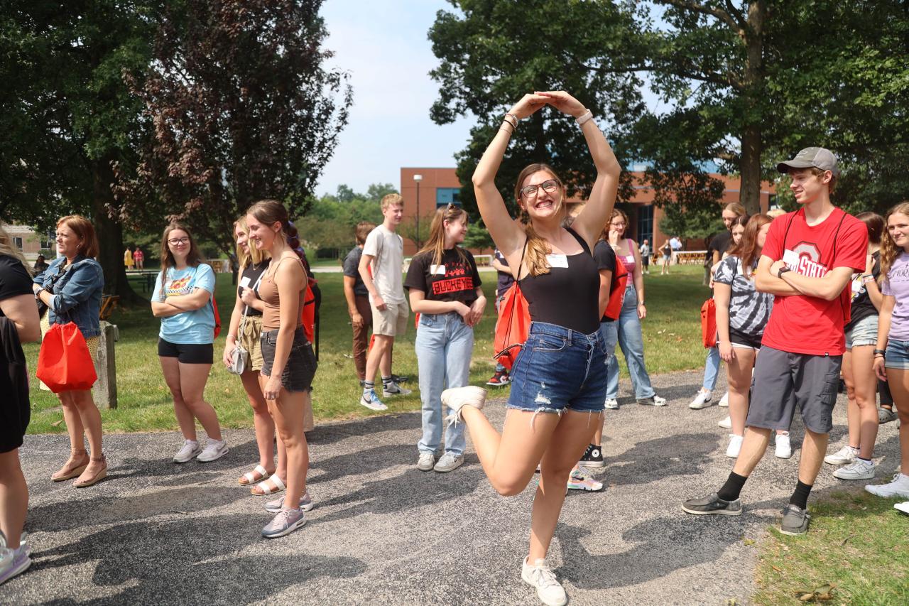Student does a Block O on the Quad at Ohio State Lima during Dean's Convocation