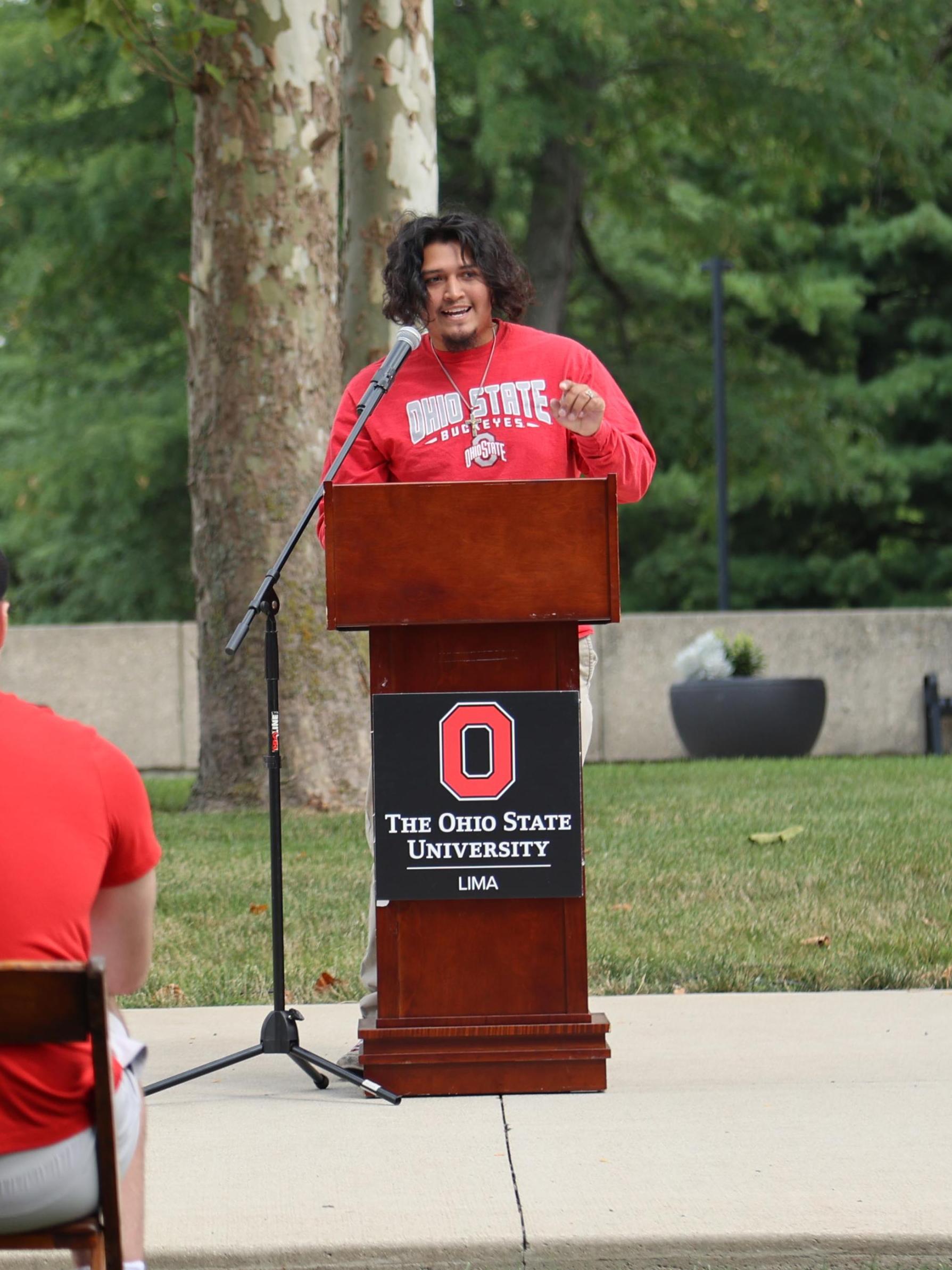 Student Jose Jones speaks at convocation