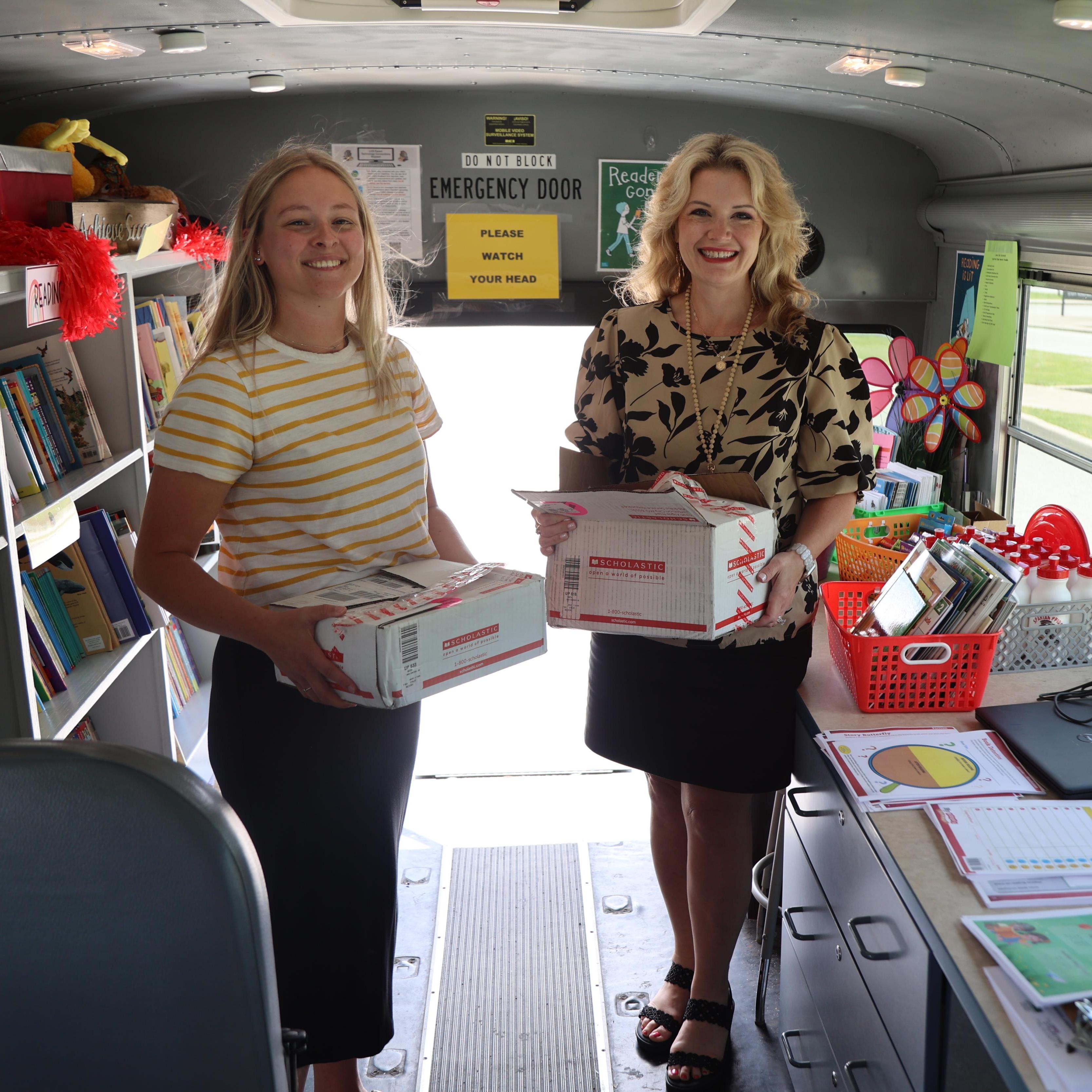 Ohio State Lima students delivers children's books to the Lima City Schools Spartan Ride for distribution