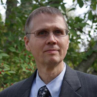 headshot of Doug Sutton-Ramspeck