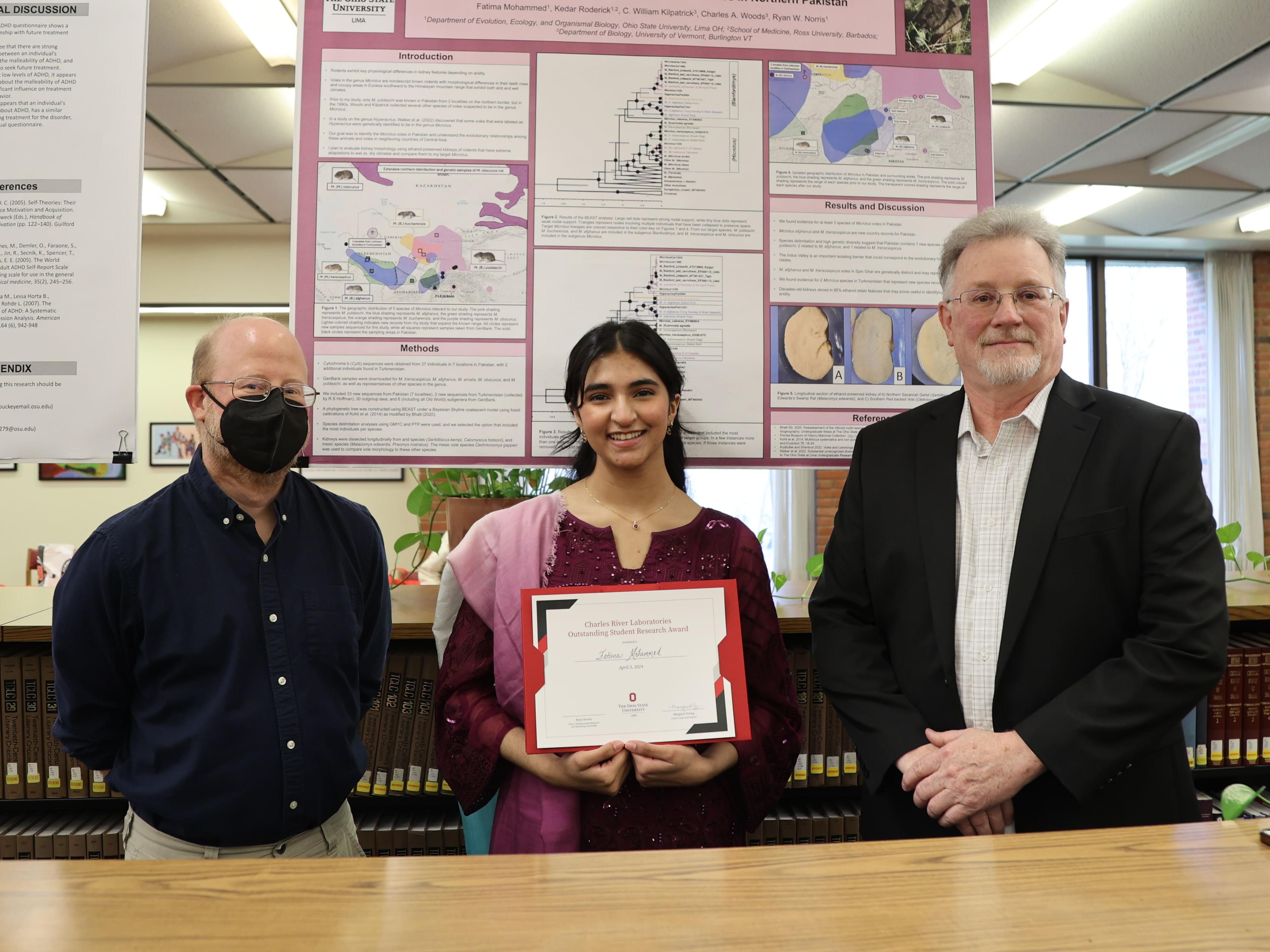 Undergraduate researcher Fatima Mohammed with mentor Ryan Norris and Charles River's Rusty Rush