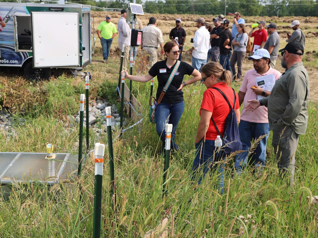 Participants examine water input systems