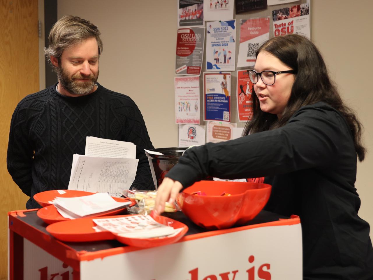 A student and professor at the Share Kindness cookie cart