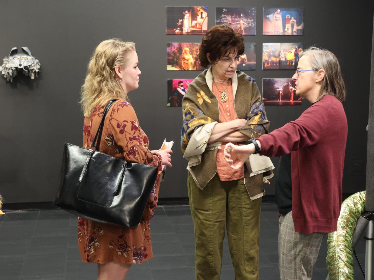 Theatre faculty and alumni talk in the Farmer Family Gallery