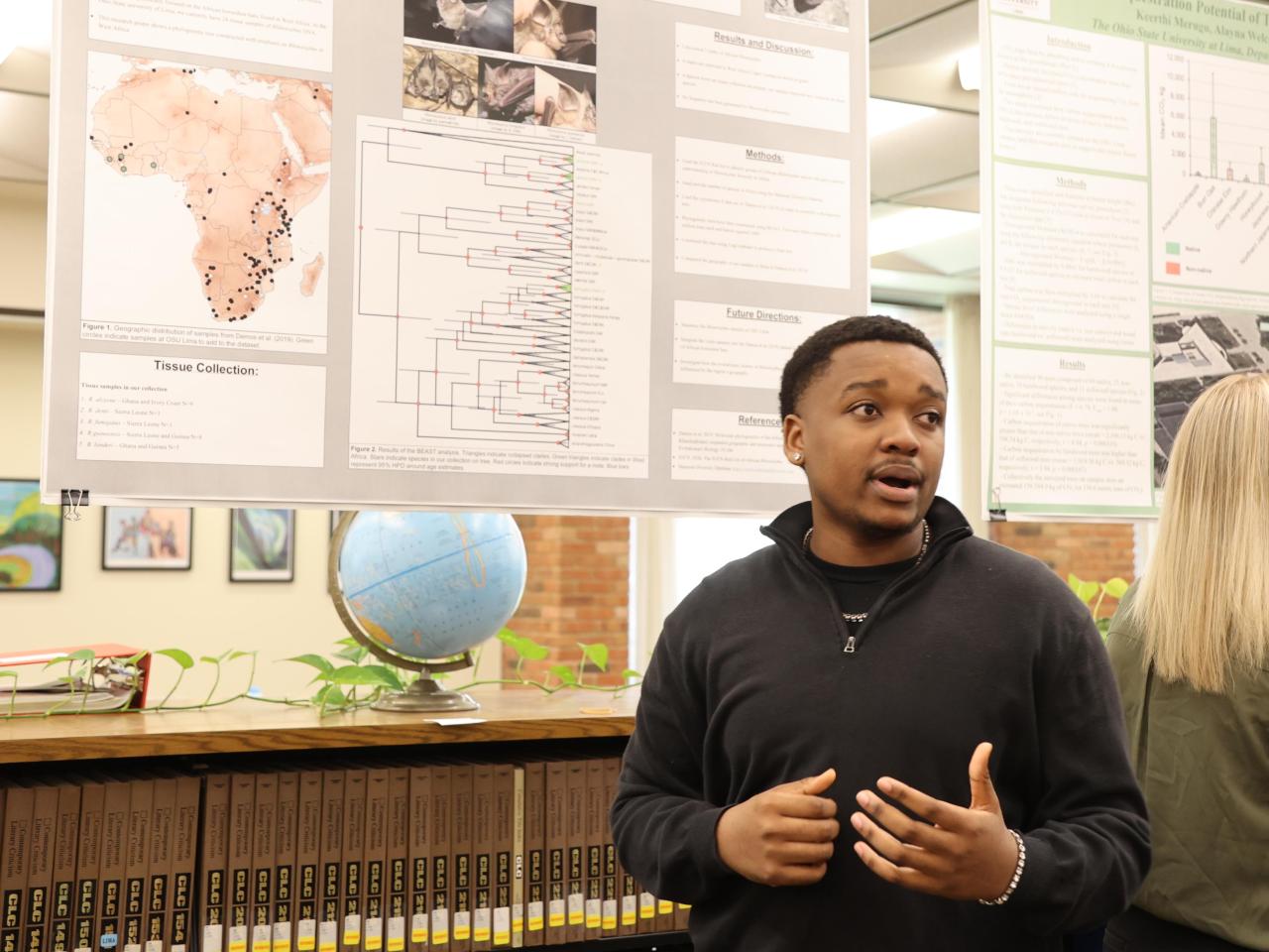 A student presents his research.