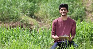 Student Waseq Mohammed in the field