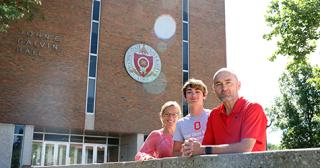 Kristen, Riley and Adam Ferguson in front of Galvin Hall