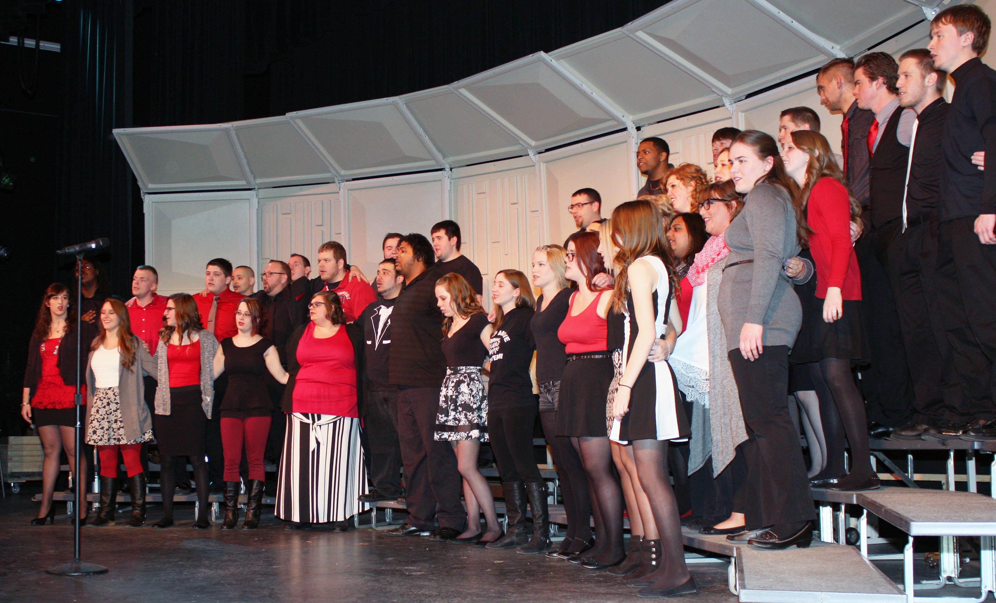 music students singing on stage during a concert