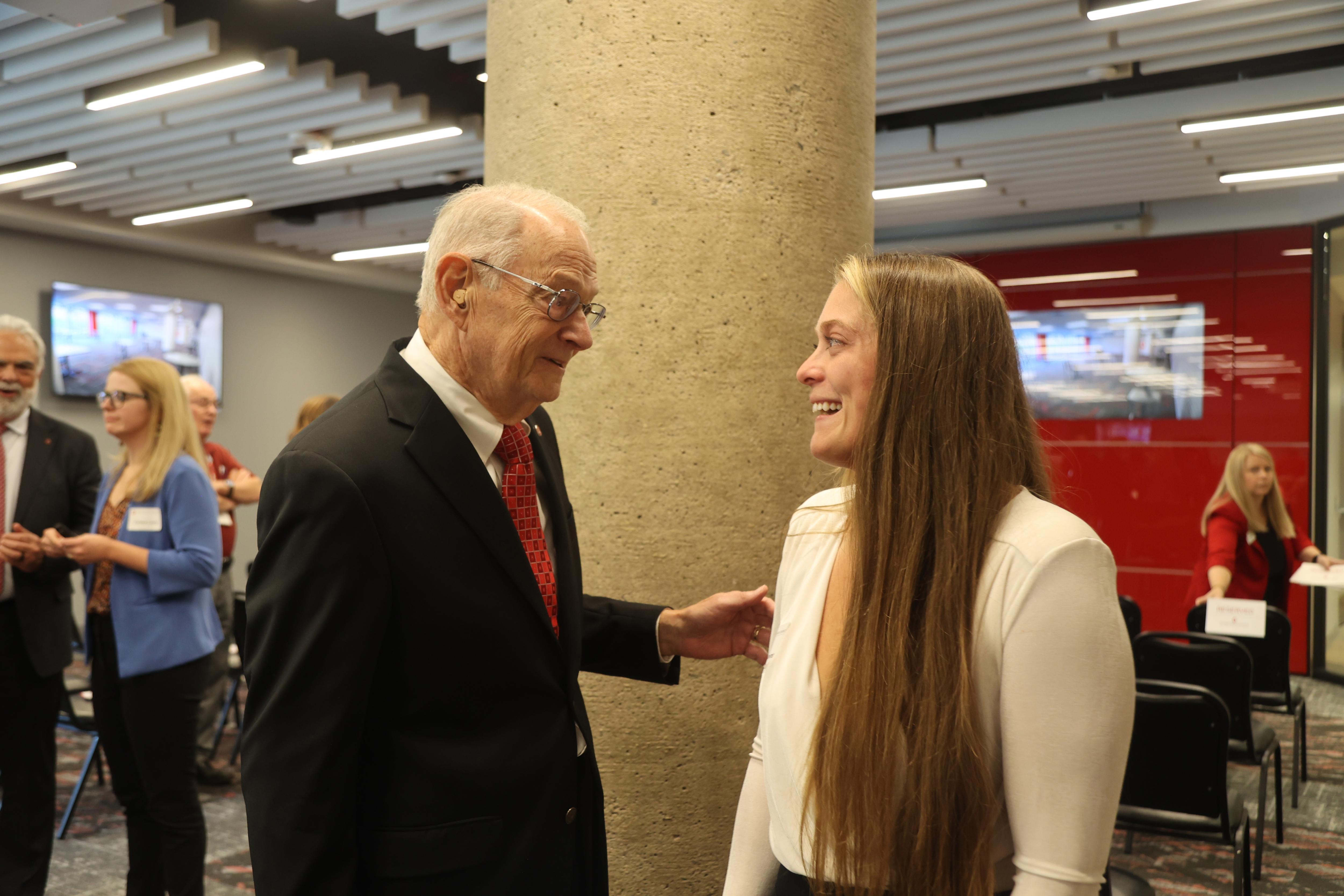 Gil Cloyd talks to student Hope Bowman in the Galvin Hall lower level