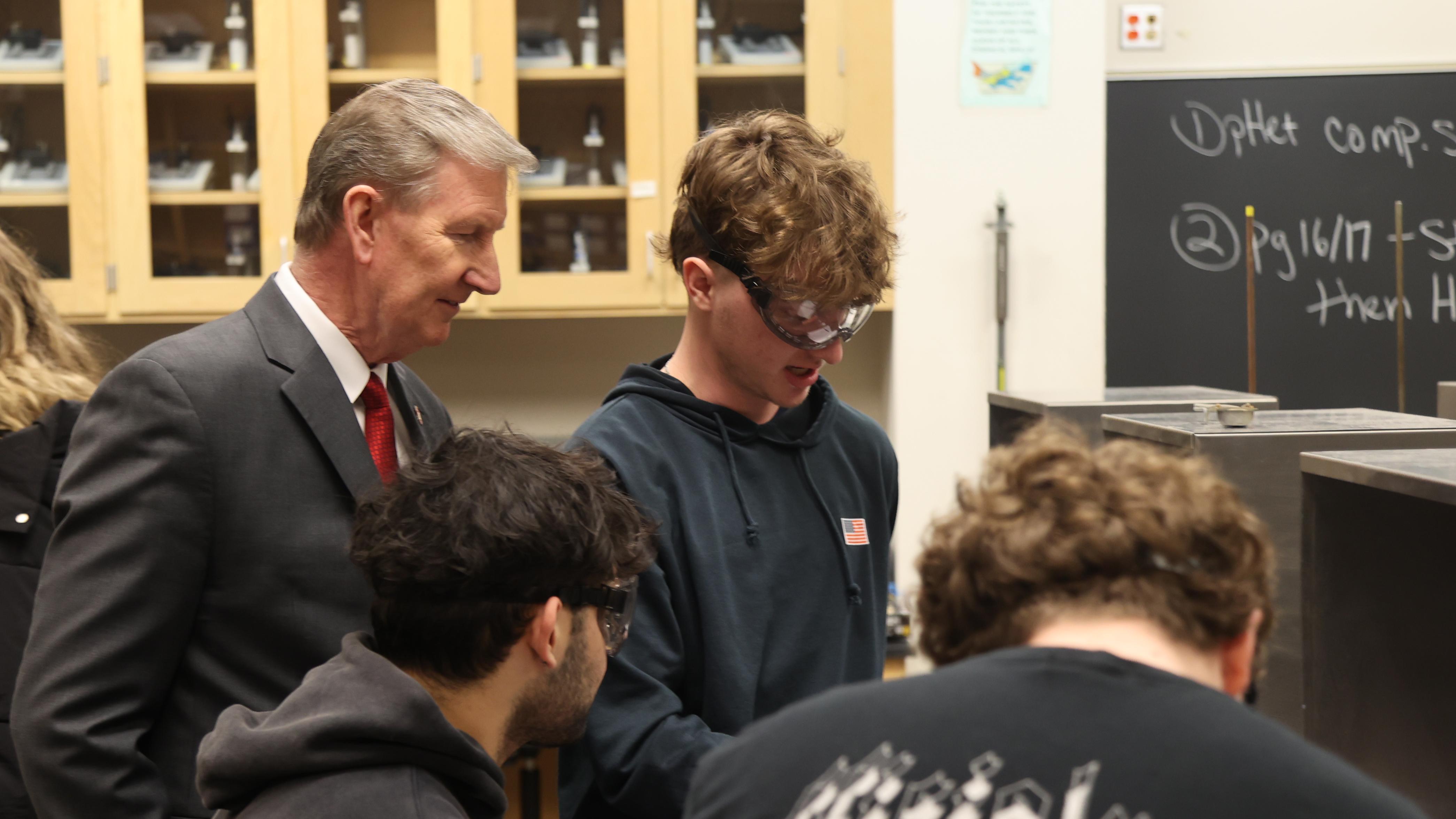 Ohio State President Carter in a Lima chemistry lab