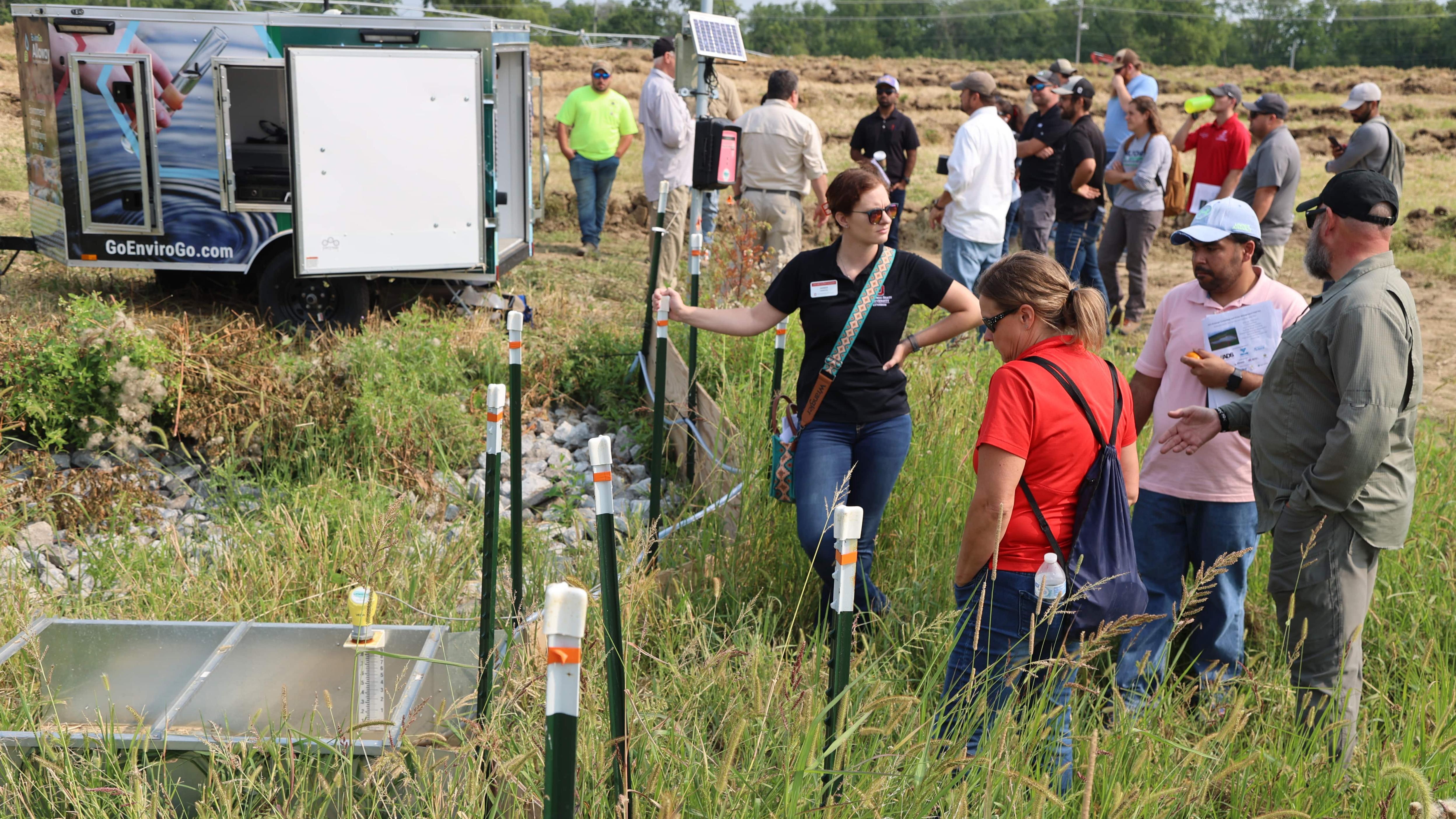 Participants examine water input systems