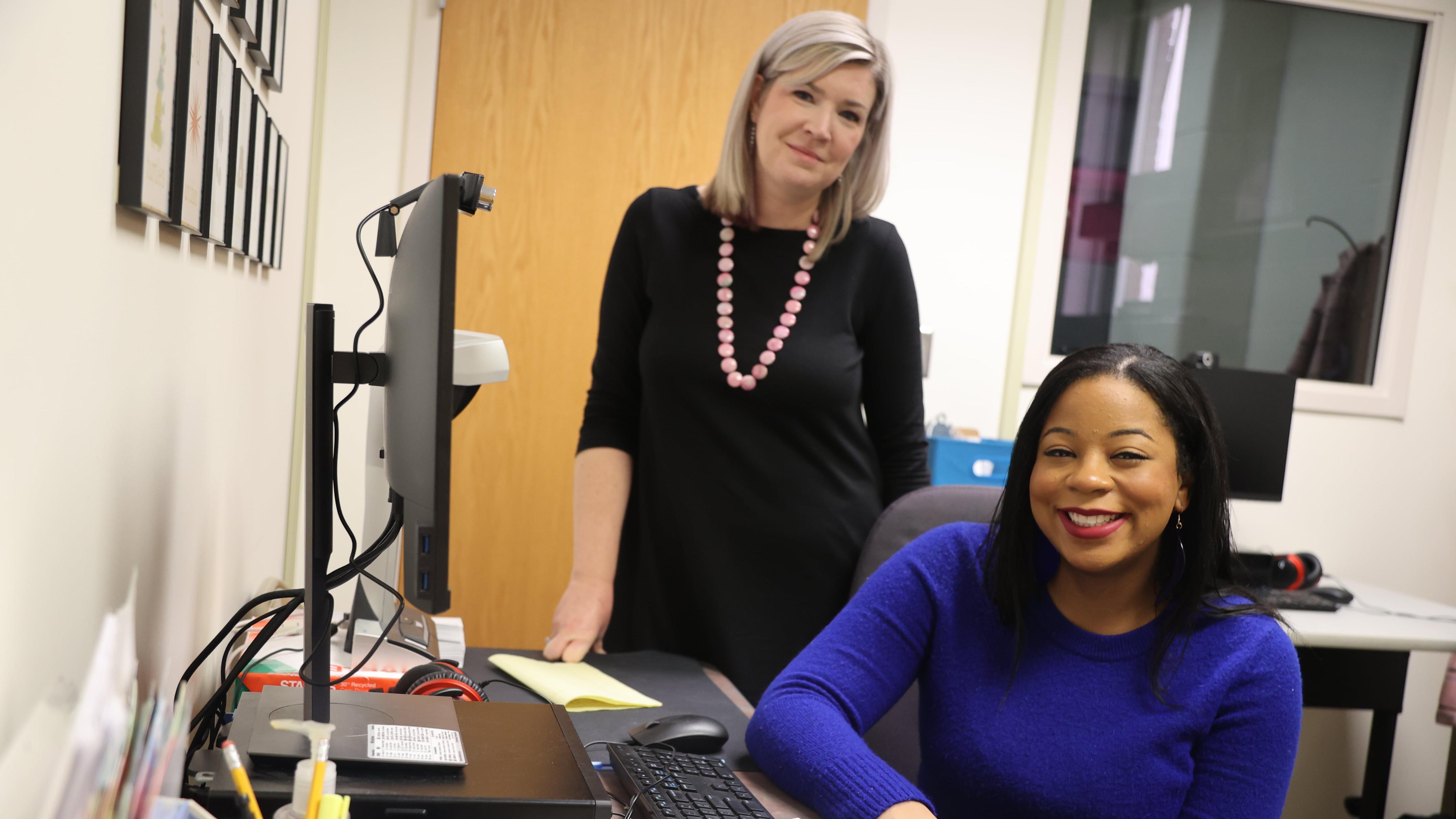 Leuviah Blakma in the lab with Dr. Virginia Tompkins