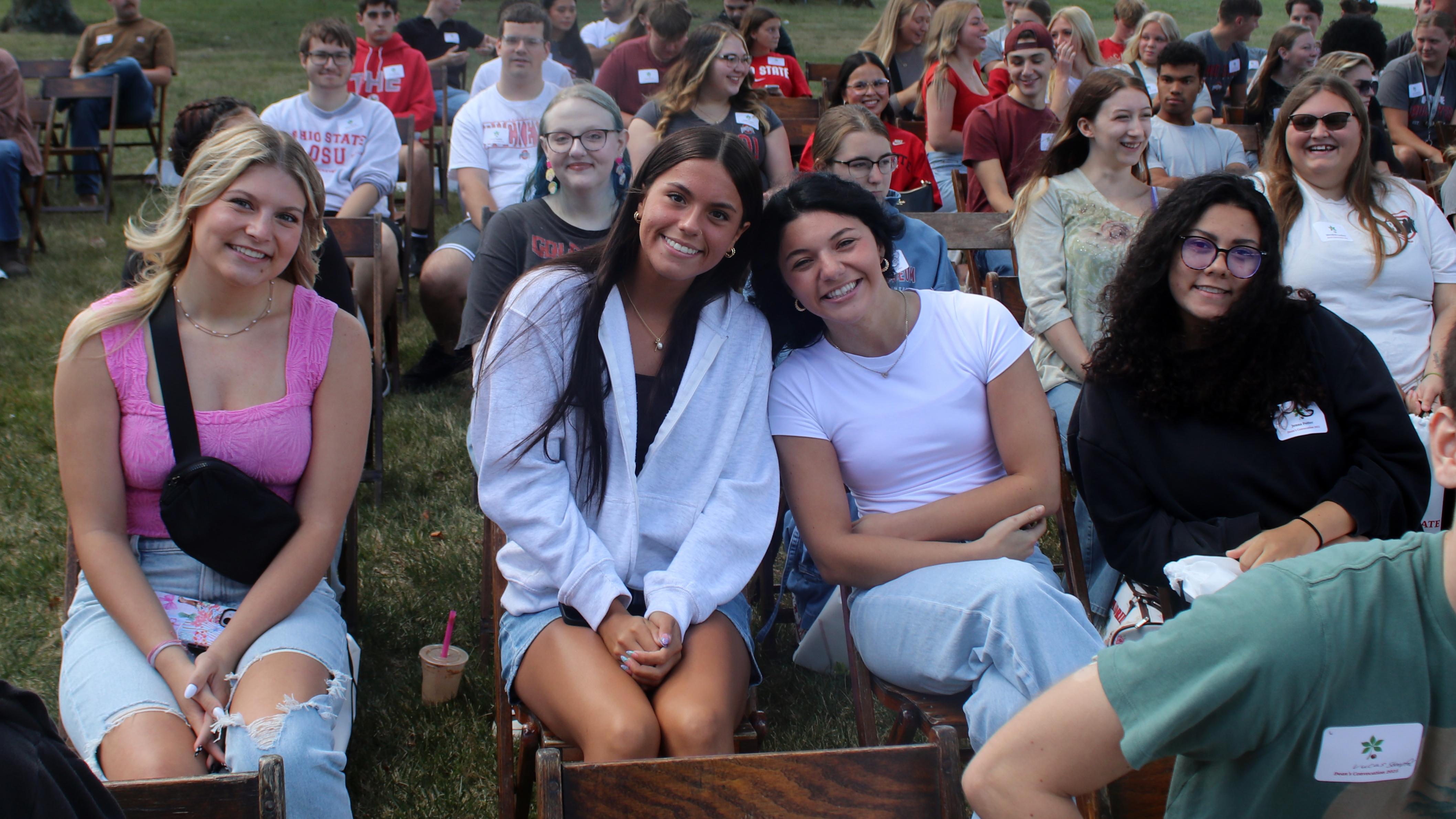 Girls smiling in a row