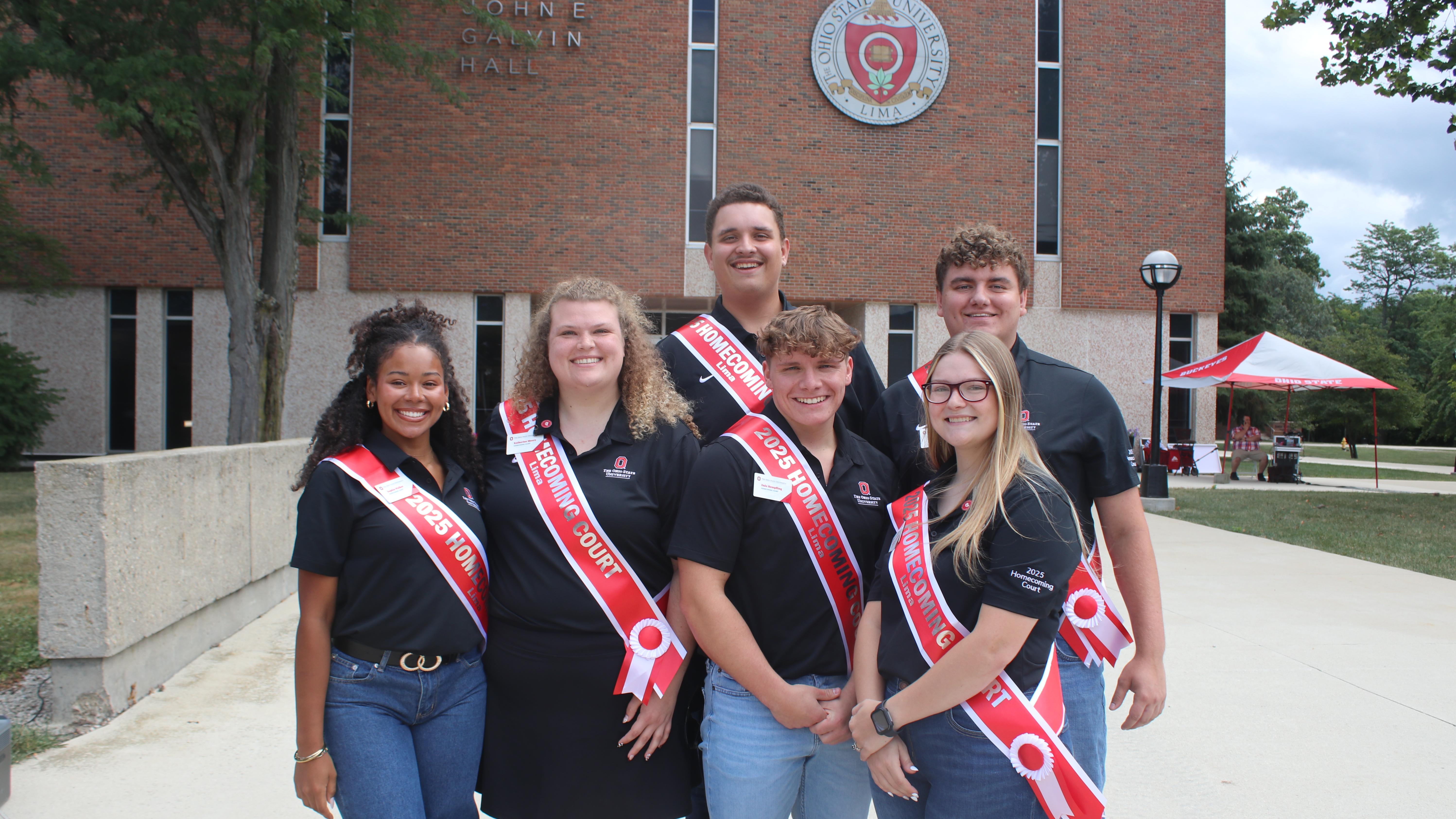 2025 homecoming court members in front of Galvin Hall