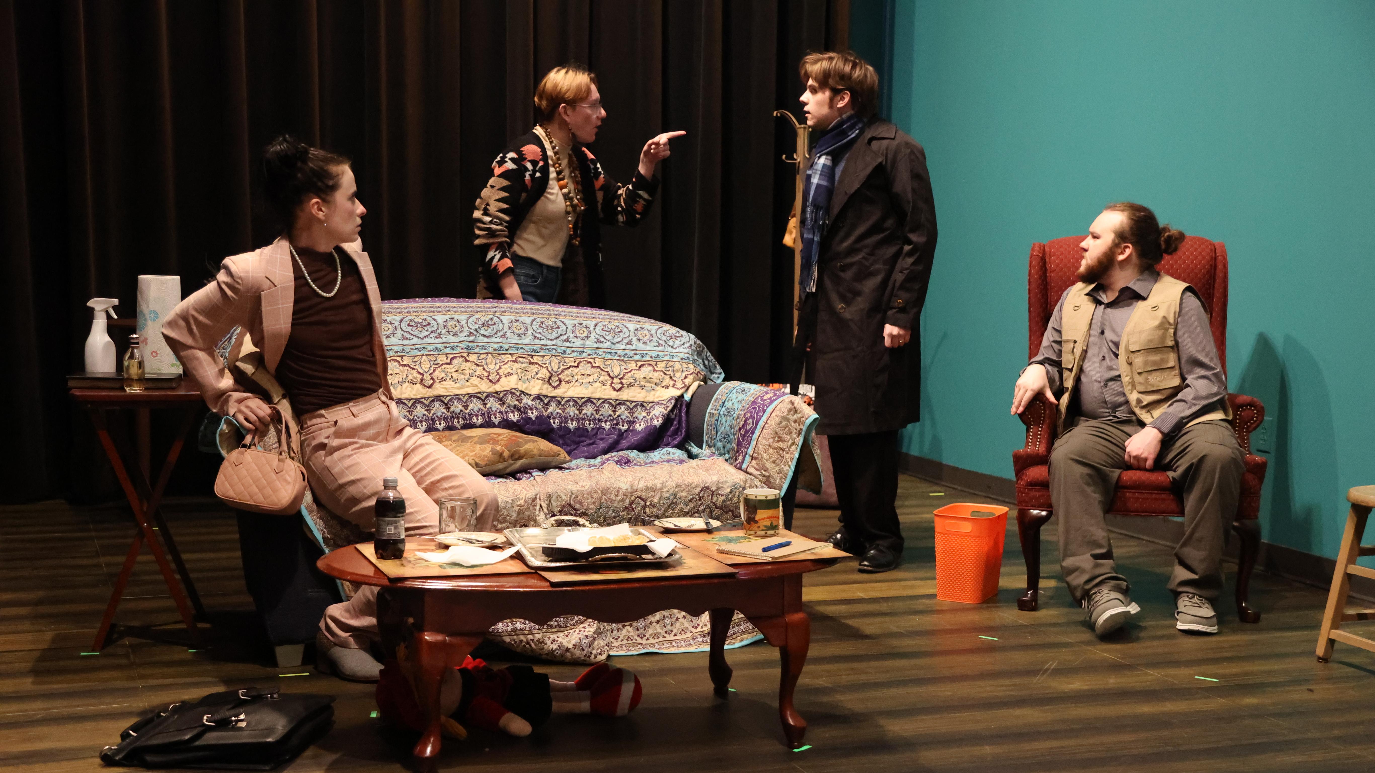 Four people argue in the play God of Carnage