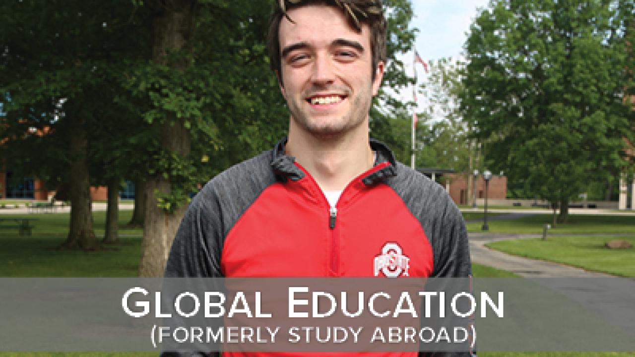 male student  outdoors with the words Global Education