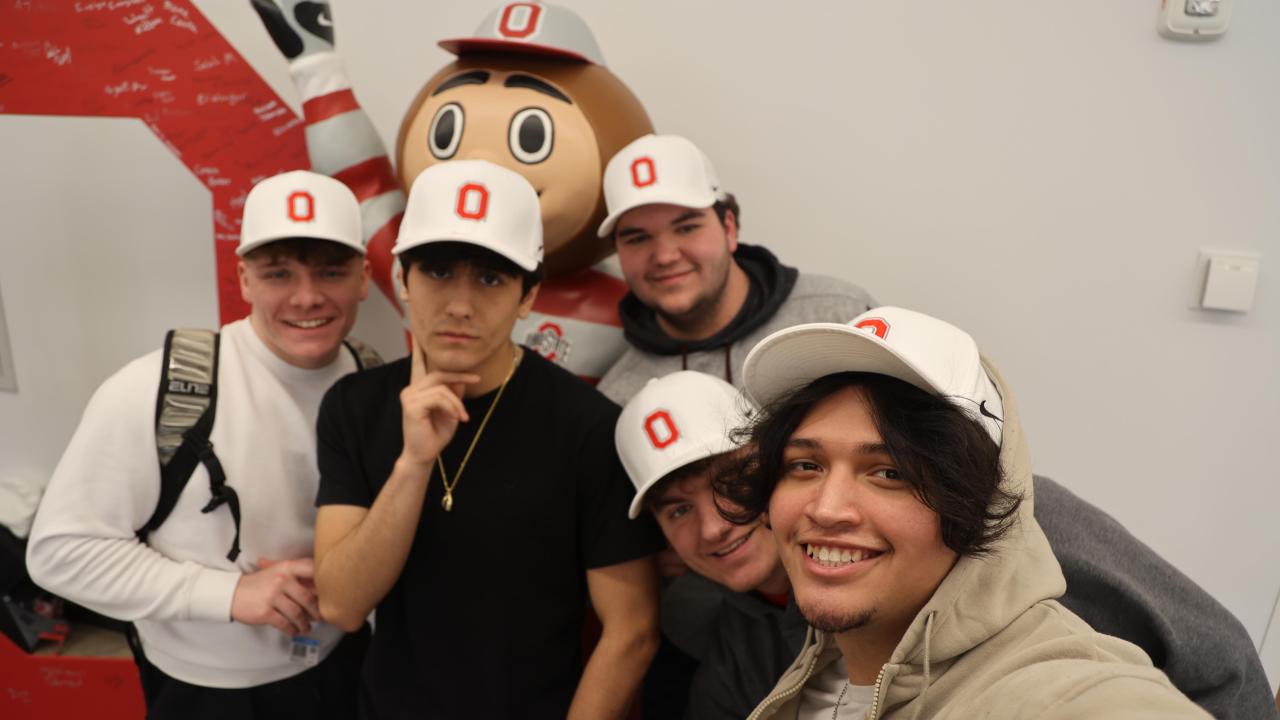 Ohio State Lima students show off their new hats