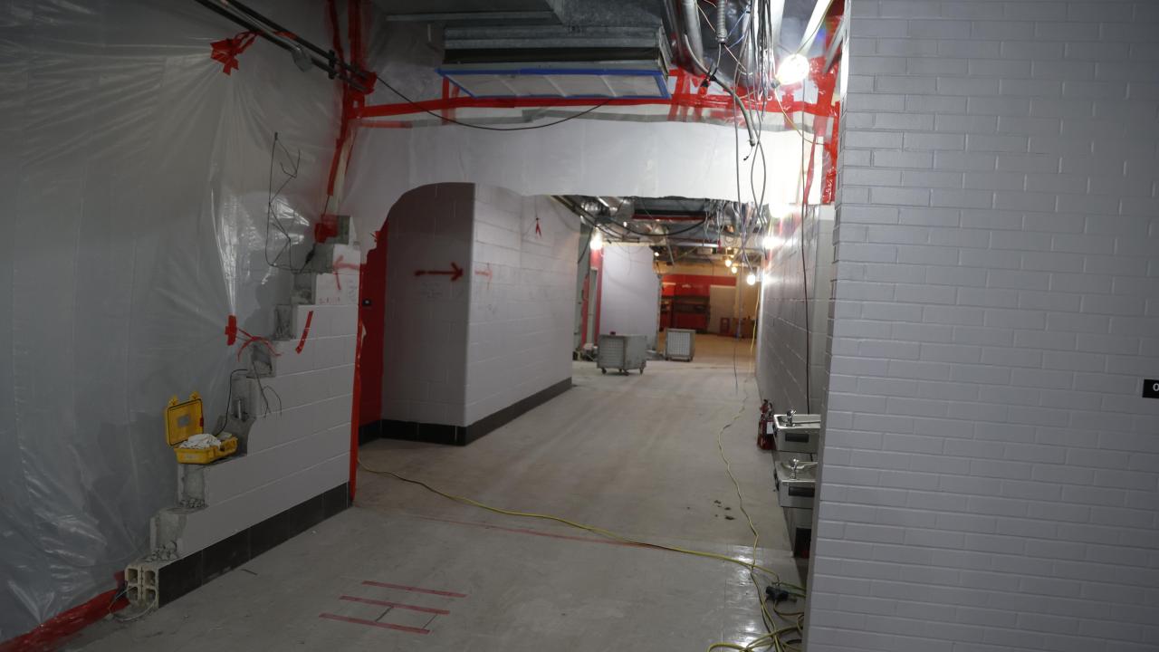 Safety barrier and cleared hallway in Galvin Basement for asbestos removal 2022-12-21-2