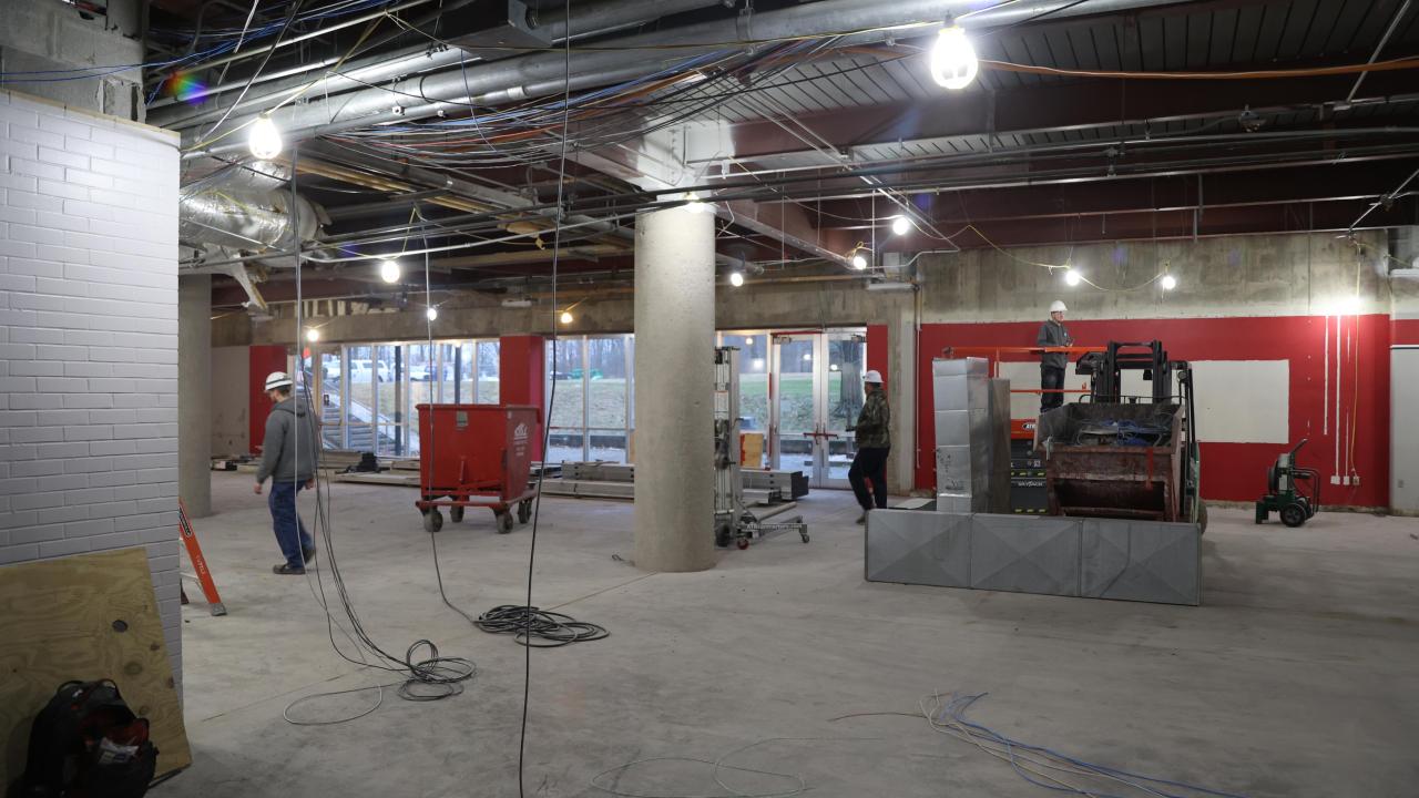 Construction workers using equipment in Galvin basement 2023-01-13-1