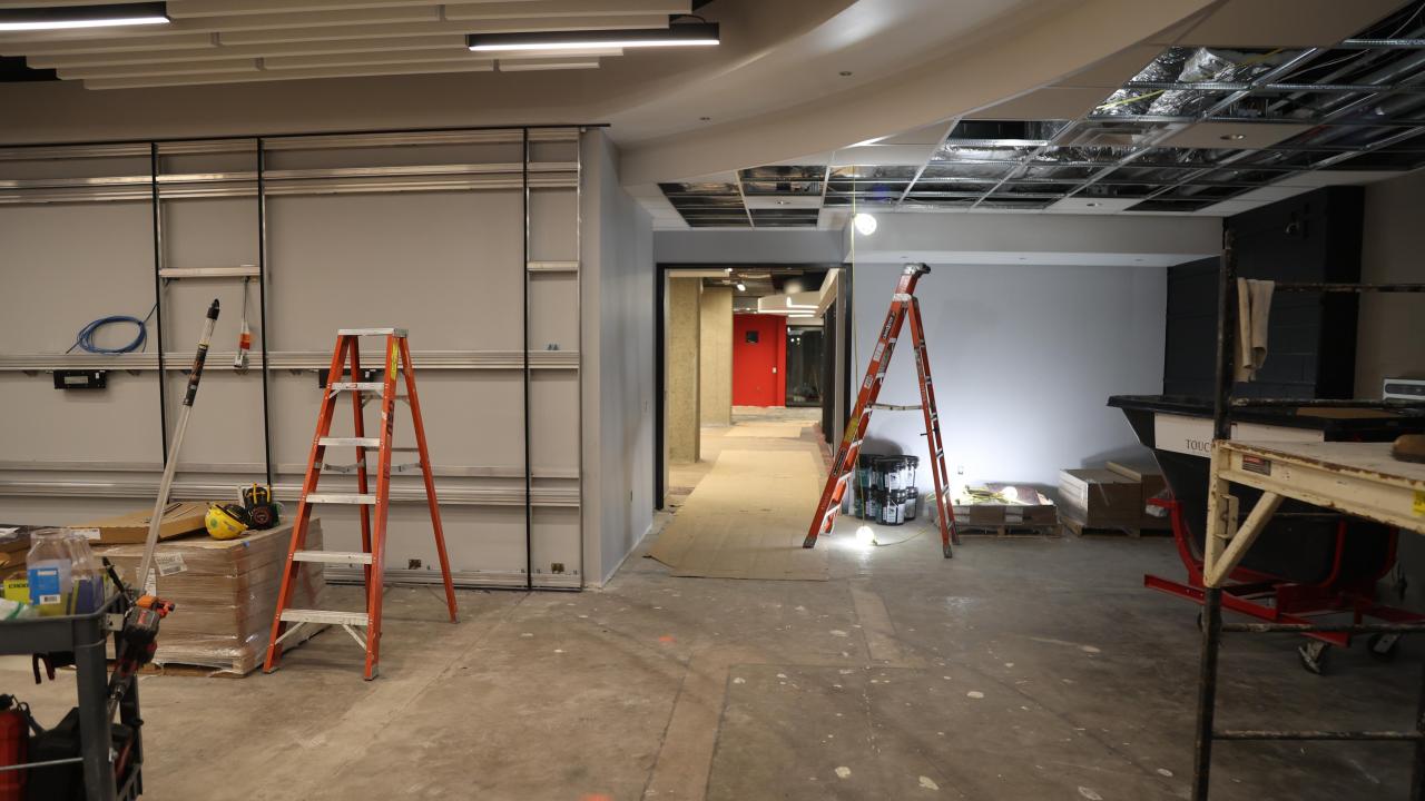 brackets on walls, some lights installed with construction equipment in galvin basement 2023-06-23-2